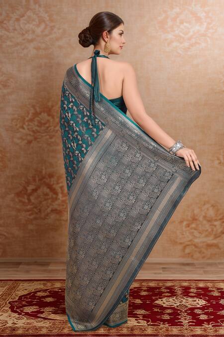Shop Naintara Bajaj Blue Brocade, Silk Zari Halter Neck Woven Banarasi Saree And Blouse Set at Aza Fashions Shop_Naintara Bajaj_Blue Brocade, Silk Zari Halter Neck Woven Banarasi Saree And Blouse Set_at_Aza_Fashions