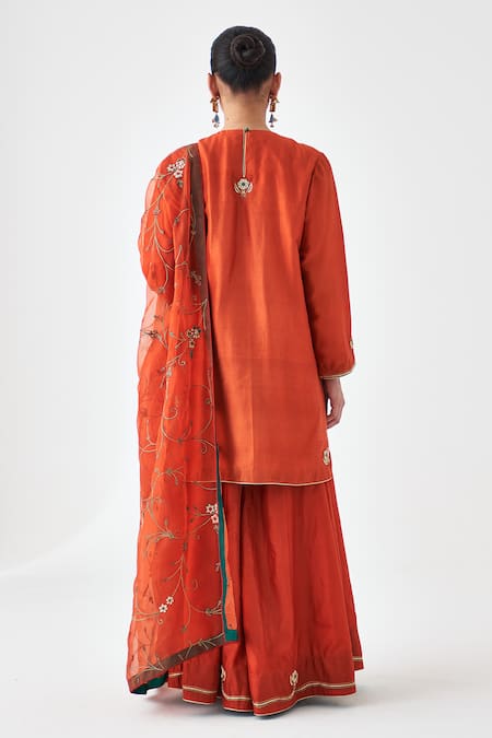 Shop Janki India Orange Silk Embroidery Round Neck Kurta And Sharara Set at Aza Fashions Shop_Janki India_Orange Silk Embroidery Round Neck Kurta And Sharara Set _at_Aza_Fashions