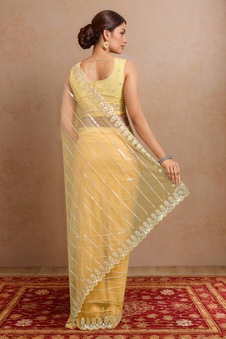 Shop Samyukta Singhania Yellow Net Sequins Round Neck Work Saree Set at Aza Fashions Shop_Samyukta Singhania_Yellow Net Sequins Round Neck Work Saree Set_at_Aza_Fashions