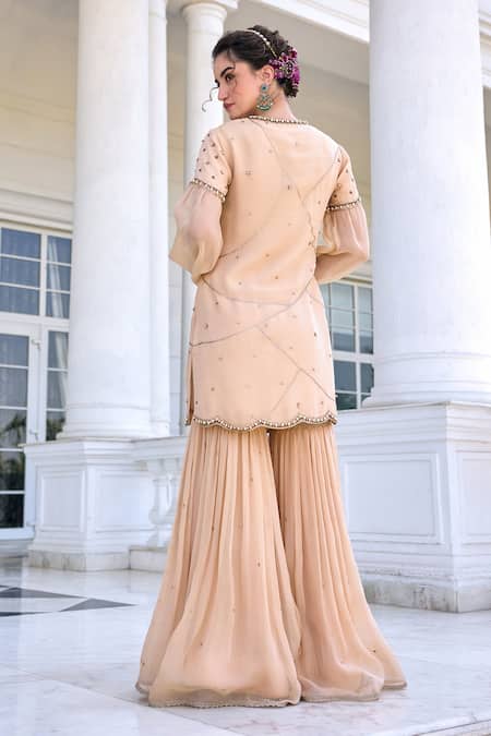 Shop Kalista Beige Tissue, Silk Embroidery Round Neck Zainab Kurta Set With Gharara at Aza Fashions Shop_Kalista_Beige Tissue, Silk Embroidery Round Neck Zainab Kurta Set With Gharara _at_Aza_Fashions