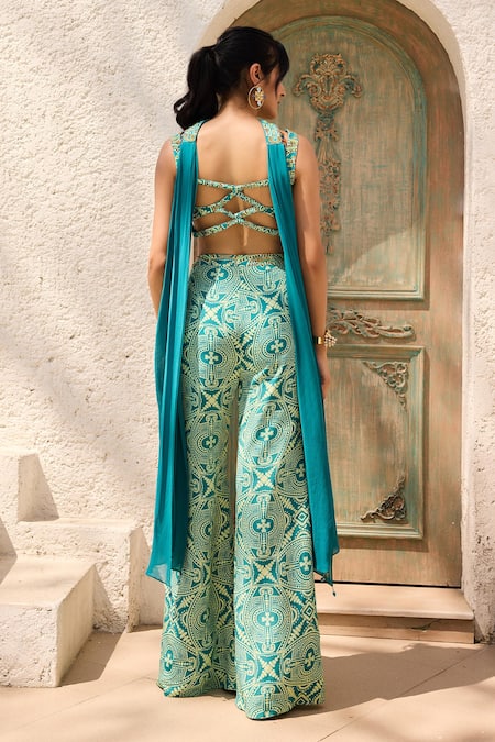 Shop Diyarajvvir Teal Crepe Square Neck Asymmetric Printed Crop Top Pant Set at Aza Fashions Shop_Diyarajvvir_Teal Crepe Square Neck Asymmetric Printed Crop Top Pant Set _at_Aza_Fashions