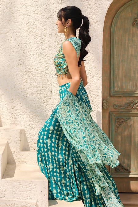Diyarajvvir Teal Georgette Beads Round Neck Asymmetric Printed Crop Top Pant Set at Aza Fashions Diyarajvvir_Teal Georgette Beads Round Neck Asymmetric Printed Crop Top Pant Set _at_Aza_Fashions