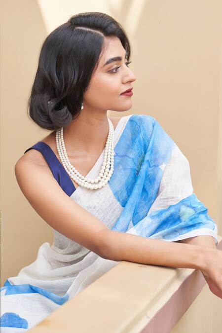 Five Point Five White Linen Blue Floral Print Saree With Running Blouse Online at Aza Fashions Five Point Five_White Linen Blue Floral Print Saree With Running Blouse _Online_at_Aza_Fashions