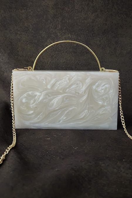 Shop Adwita Bags & Jewels White Stone Bloomingdale Floral Carved Clutch Bag at Aza Fashions Shop_Adwita Bags & Jewels_White Stone Bloomingdale Floral Carved Clutch Bag _at_Aza_Fashions