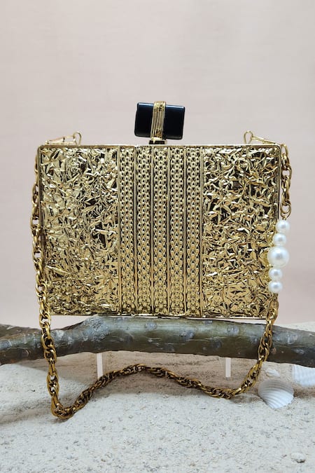 Shop Adwita Bags & Jewels Gold Mother Of Pearl Freya Floral Carved Bag at Aza Fashions Shop_Adwita Bags & Jewels_Gold Mother Of Pearl Freya Floral Carved Bag _at_Aza_Fashions