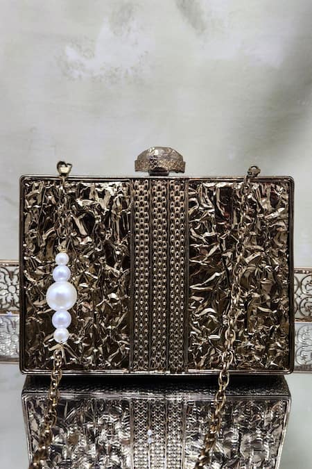 Shop Adwita Bags & Jewels Gold Embroidery Ahmet Geometric Carved Clutch at Aza Fashions Shop_Adwita Bags & Jewels_Gold Embroidery Ahmet Geometric Carved Clutch _at_Aza_Fashions