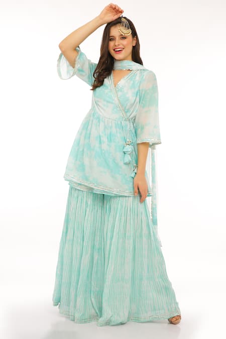 Preevin_Blue Cotton, Net Tassels Keyhole Neck Printed Peplum Kurta And Sharara Set_Online_at_Aza_Fashions
