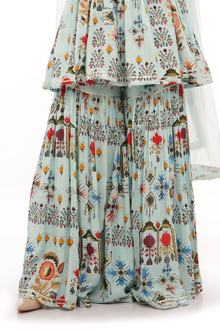 Preevin_Blue Cotton, Net Embroidery Keyhole Neck Floral Printed Peplum Kurta Set _at_Aza_Fashions