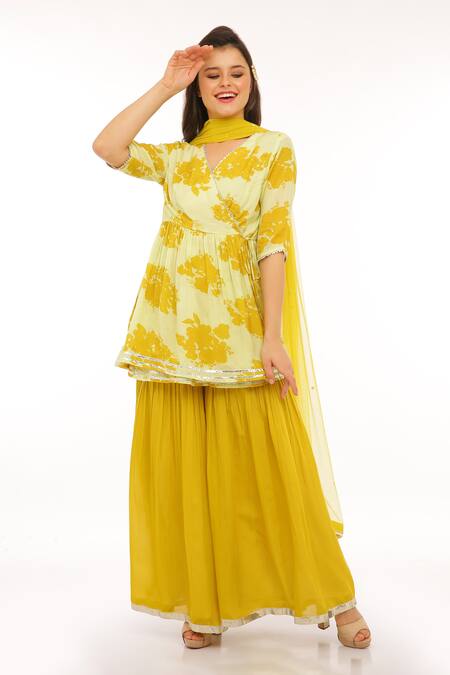 Preevin_Yellow Cotton, Tulle, Net V-neck Floral Peplum Kurta Set _Online_at_Aza_Fashions