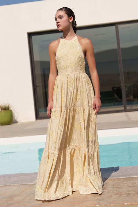 Shop Shruti Sancheti Yellow Muslin Embroidery Halter Neck Maxi Dress at Aza Fashions Shop_Shruti Sancheti_Yellow Muslin Embroidery Halter Neck Maxi Dress _at_Aza_Fashions