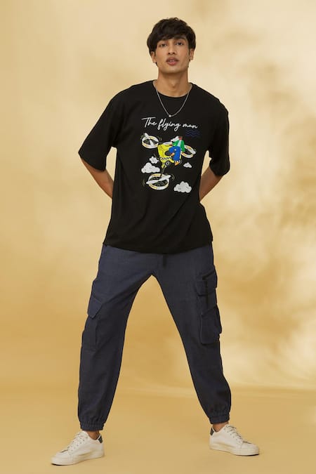 Theorem Black Cotton The Flying Man Graphic T-shirt Online at Aza Fashions Theorem_Black Cotton The Flying Man Graphic T-shirt _Online_at_Aza_Fashions