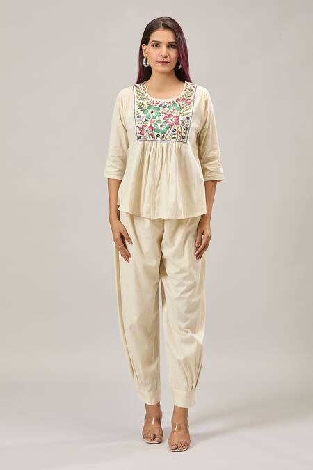 Buy Naintara Bajaj Off White Cotton Embroidery Round Neck Peplum Top And Balloon Pant Set Online at Aza Fashions Buy_Naintara Bajaj_Off White Cotton Embroidery Round Neck Peplum Top And Balloon Pant Set _Online_at_Aza_Fashions