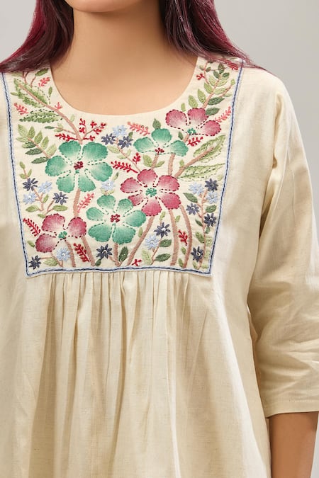 Buy Naintara Bajaj Off White Cotton Embroidery Round Neck Peplum Top And Balloon Pant Set Buy_Naintara Bajaj_Off White Cotton Embroidery Round Neck Peplum Top And Balloon Pant Set