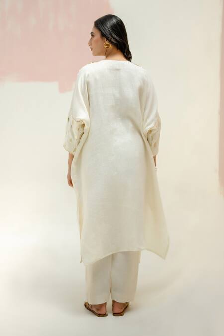 Shop Prahnaaya White Linen Embroidery V-neck Star Antifit Kurta And Pants Set at Aza Fashions Shop_Prahnaaya_White Linen Embroidery V-neck Star Antifit Kurta And Pants Set_at_Aza_Fashions