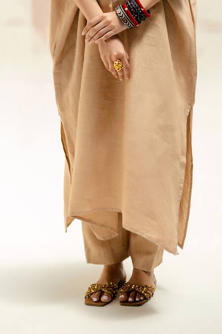 Buy Prahnaaya Beige Linen Round Neck Longline Kaftan Kurta Set Online at Aza Fashions Buy_Prahnaaya_Beige Linen Round Neck Longline Kaftan Kurta Set_Online_at_Aza_Fashions