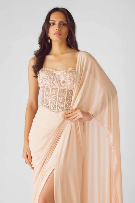 Basanti - Kapde Aur Koffee_Peach Georgette Sequins, Pearls Blush Opulence Corset Draped Saree Gown_at_Aza_Fashions