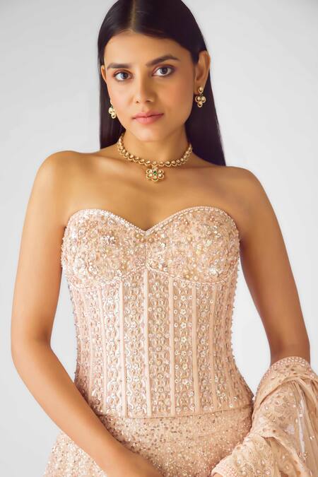 Basanti - Kapde Aur Koffee_Peach Net Sequins, Beads Sweetheart Neck Rose Champagne Corset Lehenga Set_Online_at_Aza_Fashions