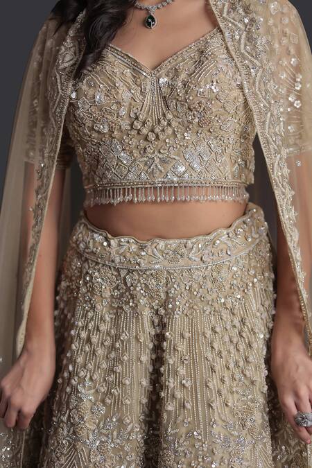 Samyukta Singhania_Brown Net Sequins, Beads, Embroidery Sweetheart Neck Classic Lehenga Set_at_Aza_Fashions