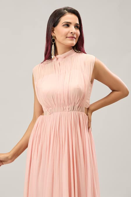 Naintara Bajaj Beige Georgette High Neck Pleated Maxi Dress at Aza Fashions Naintara Bajaj_Beige Georgette High Neck Pleated Maxi Dress _at_Aza_Fashions