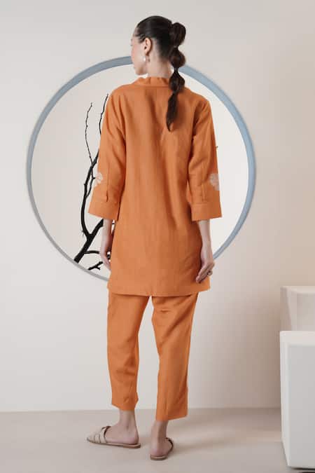 Shop Surabhi Arya Orange Linen Embroidery Split V-neck Thread Pant Set at Aza Fashions Shop_Surabhi Arya_Orange Linen Embroidery Split V-neck Thread Pant Set _at_Aza_Fashions