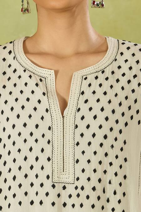 House Of Kotwara Ivory Cotton Embroidery Split V-neck Polka Dot Kurta Set at Aza Fashions House Of Kotwara_Ivory Cotton Embroidery Split V-neck Polka Dot Kurta Set _at_Aza_Fashions