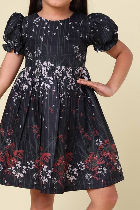 Petite Pomme_Black Linen Floral Printed Dress With Puff Sleeves_at_Aza_Fashions