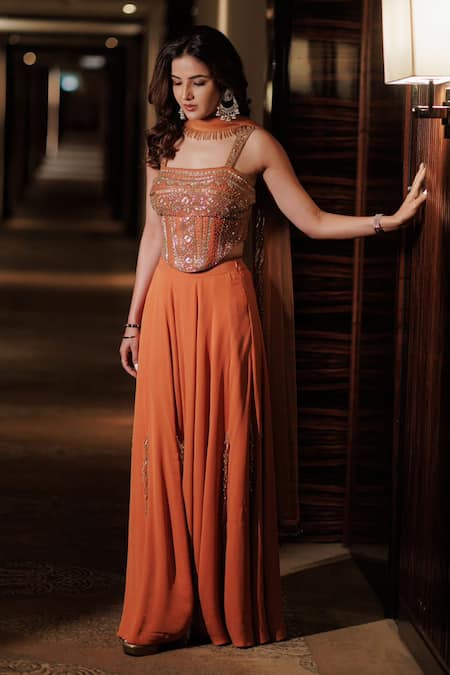 Shop_Reeti Arneja_Orange Net, Georgette Sequins, Beads, Embroidery Floral Corset Sharara Set 
