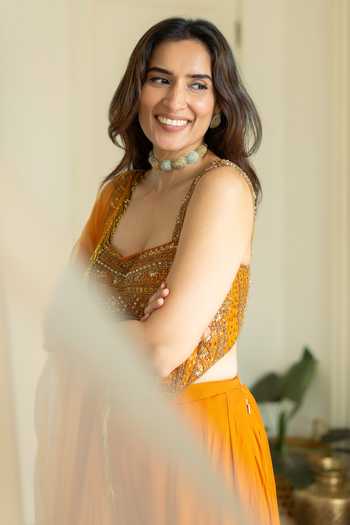 Shop_Reeti Arneja_Orange Net, Georgette Sequins, Beads, Embroidery Floral Corset Sharara Set 