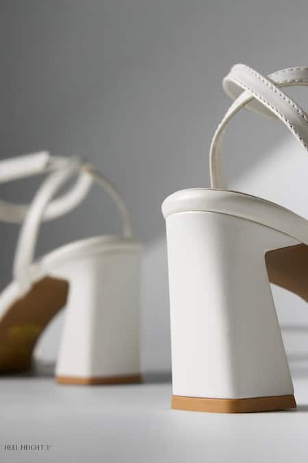Shop_Signature Sole_White Buckles Strap Block Heels _Online_at_Aza_Fashions