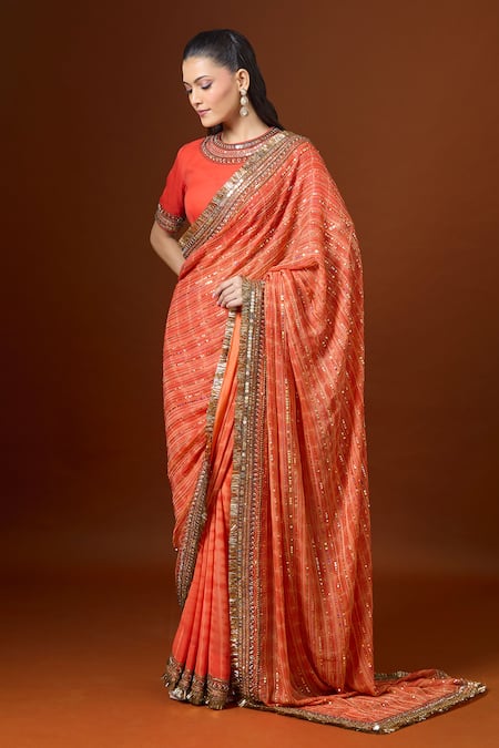 Buy Yoshita Couture Orange Sequins, Zari, Embroidery Round Neck Resham Saree With Blouse Online at Aza Fashions Buy_Yoshita Couture_Orange Sequins, Zari, Embroidery Round Neck Resham Saree With Blouse _Online_at_Aza_Fashions