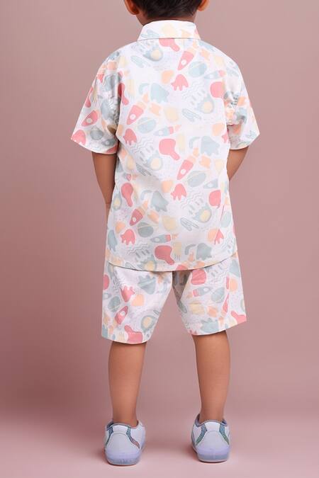 Shop Petite Pomme Multi Color Cotton Multicolor Printed Kids Shirt And Shorts Set at Aza Fashions Shop_Petite Pomme_Multi Color Cotton Multicolor Printed Kids Shirt And Shorts Set_at_Aza_Fashions
