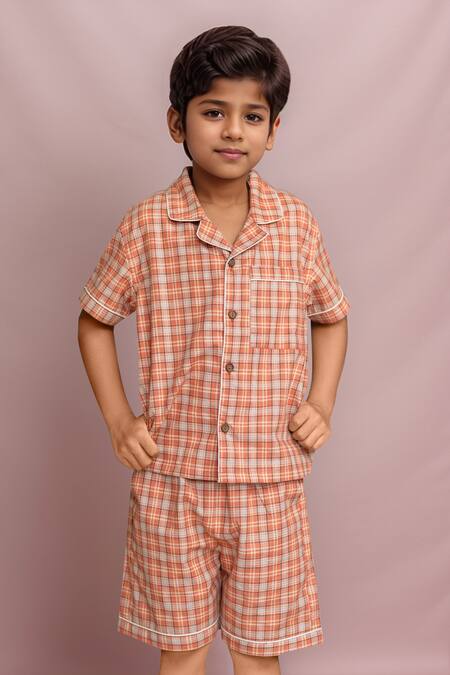 Shop Petite Pomme Orange Cotton Checked Shirt And Shorts Set at Aza Fashions Shop_Petite Pomme_Orange Cotton Checked Shirt And Shorts Set_at_Aza_Fashions