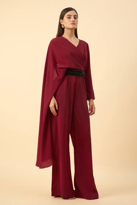 Aakaar_Red Muslin, Crepe Beads V-neck Designer Jumpsuit With Belt _at_Aza_Fashions