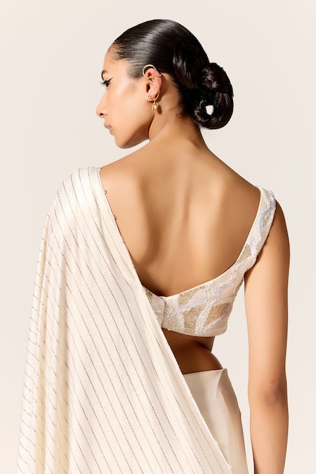 Manika Nanda Ivory Metallic Lycra Slit Saree 