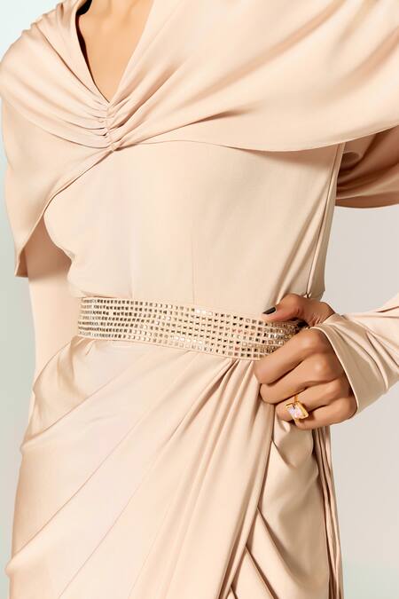 Shop Manika Nanda Beige Lycra Rhinestones Cowl Neck Draped Cape Gown With Belt Online at Aza Fashions Shop_Manika Nanda_Beige Lycra Rhinestones Cowl Neck Draped Cape Gown With Belt _Online_at_Aza_Fashions