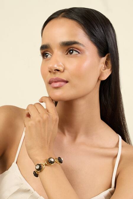 Isharya Black Crystals Midnight Luxe Cuff Bracelet at Aza Fashions Isharya_Black Crystals Midnight Luxe Cuff Bracelet_at_Aza_Fashions