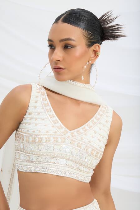 Mirroir_Ivory Viscose, Net Sequins, Beads, Embroidery V-neck Crepe Classic Lehenga Set _at_Aza_Fashions