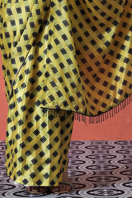 Naintara Bajaj_Yellow Round Neck And Black Printed Pre-draped Saree _at_Aza_Fashions