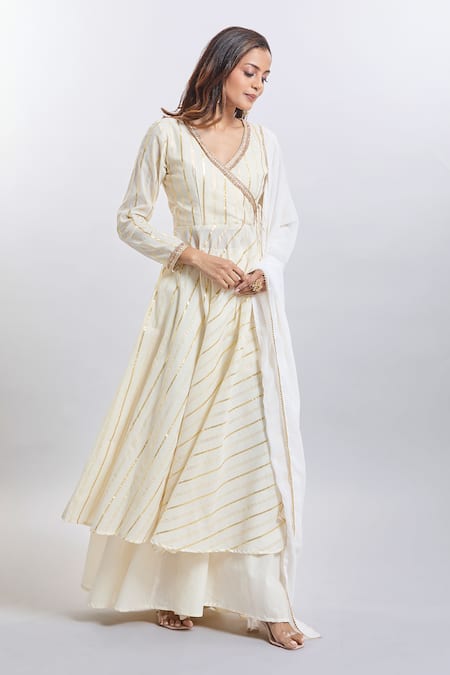 Shop_Samyukta Singhania_White Cotton, Georgette Zari V-neck Gold Stripe Kurta Palazzo Set _Online_at_Aza_Fashions