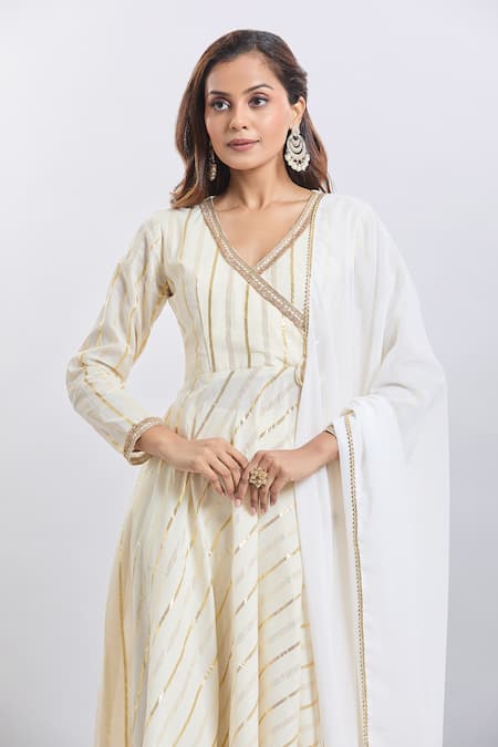 Samyukta Singhania_White Cotton, Georgette Zari V-neck Gold Stripe Kurta Palazzo Set _at_Aza_Fashions