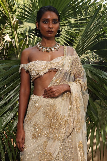 Megha Bansal_Gold Tulle, Viscose Embroidery Off-shoulder Ecru Lehenga Saree With Blouse _at_Aza_Fashions