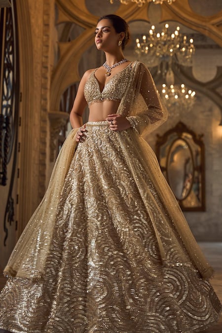 Buy_Seema Gujral_Gold Net Sequins, Beads V-neck Lehenga Set _Online_at_Aza_Fashions
