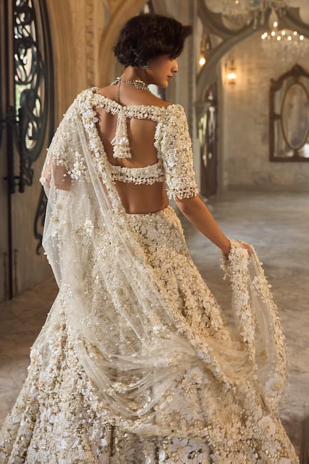 Shop_Seema Gujral_Ivory Net Embroidery, Beads, Sequins Sweetheart Three-dimensional Lehenga Set _at_Aza_Fashions