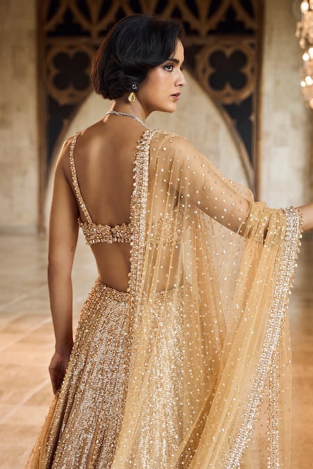 Shop_Seema Gujral_Gold Net Sequins, Beads Round Neck Crystal Lehenga Set _at_Aza_Fashions