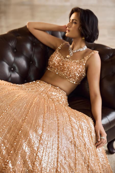 Seema Gujral_Gold Net Sequins, Beads Round Neck Crystal Lehenga Set _Online_at_Aza_Fashions