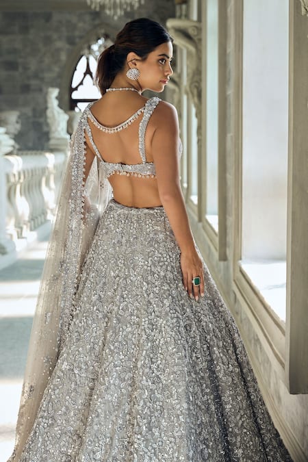 Shop_Seema Gujral_Silver Net Sequins Sweetheart Neck Embellished Lehenga Set _at_Aza_Fashions