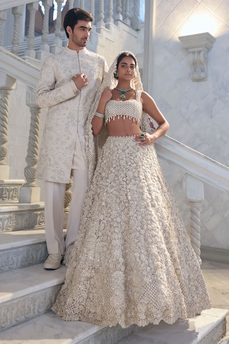 Seema Gujral_Ivory Net Pearls, Embroidery, Beads Square Neck Cut Work Lehenga Set _at_Aza_Fashions