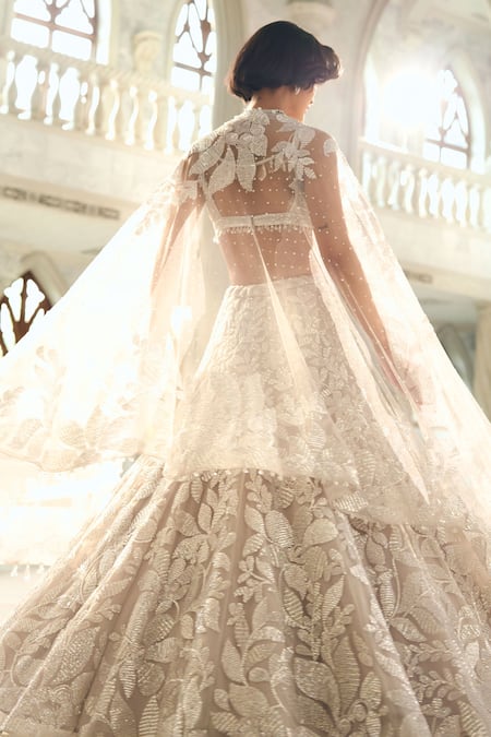 Shop Seema Gujral Silver Net Sequins, Embroidery Sweetheart Neck Floral Lehenga Set at Aza Fashions Shop_Seema Gujral_Silver Net Sequins, Embroidery Sweetheart Neck Floral Lehenga Set _at_Aza_Fashions