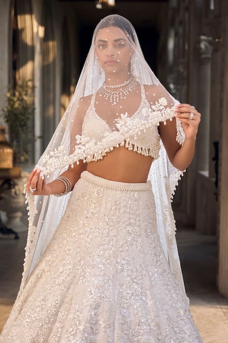 Shop Seema Gujral Ivory Net Sequins, Embroidery V-neck Floral Lehenga Set at Aza Fashions Shop_Seema Gujral_Ivory Net Sequins, Embroidery V-neck Floral Lehenga Set _at_Aza_Fashions