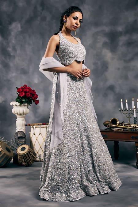 Buy_Vandana Sethi_Silver Net Sequins Halter Neck Fusion Lehenga Set _Online_at_Aza_Fashions